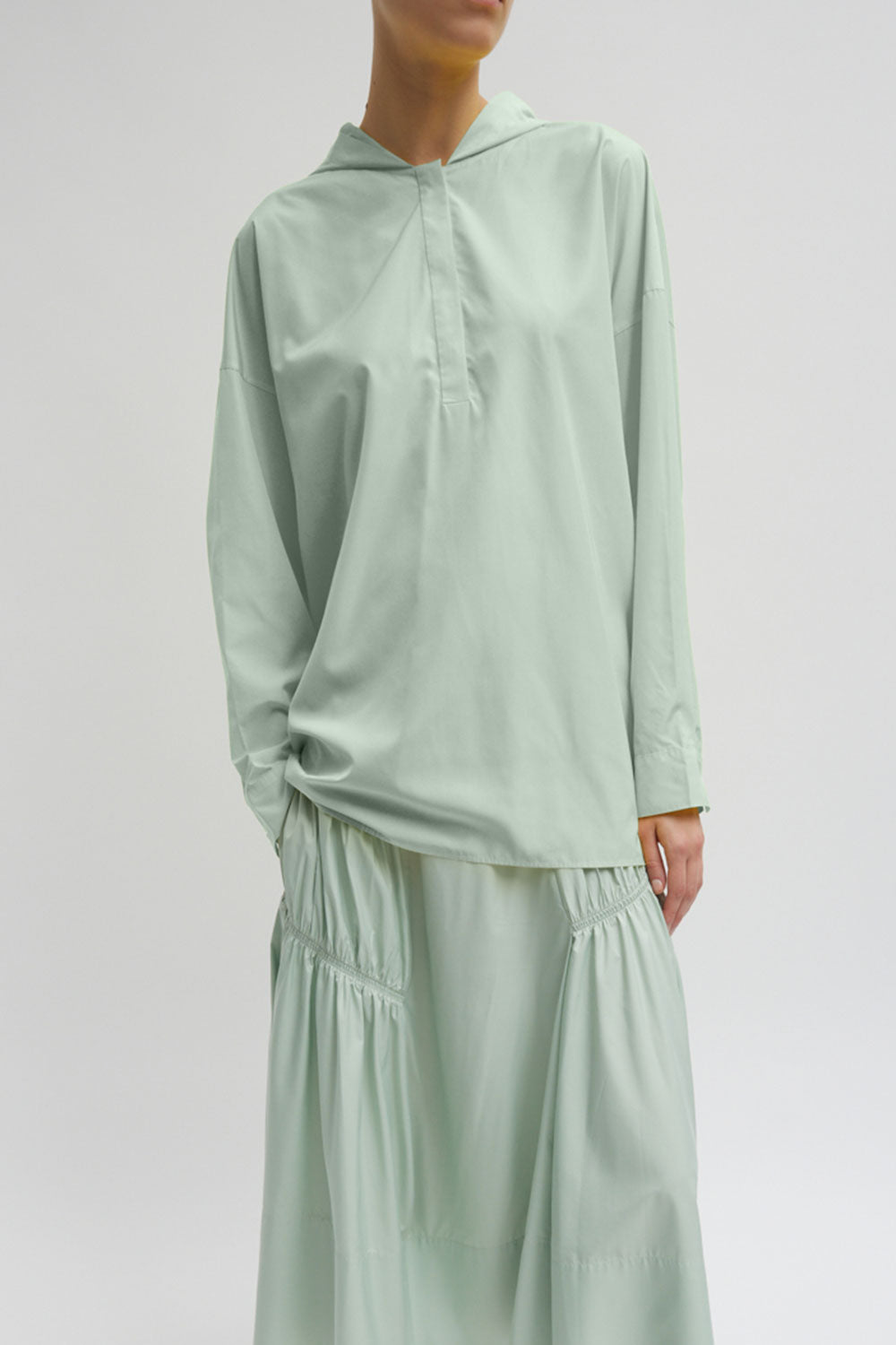 Tibi Resort Shirred Cocoon Back Hoodie Lido Green - flora and henri Tibi Resort Shirred Cocoon Back Hoodie Lido Green - flora and henri